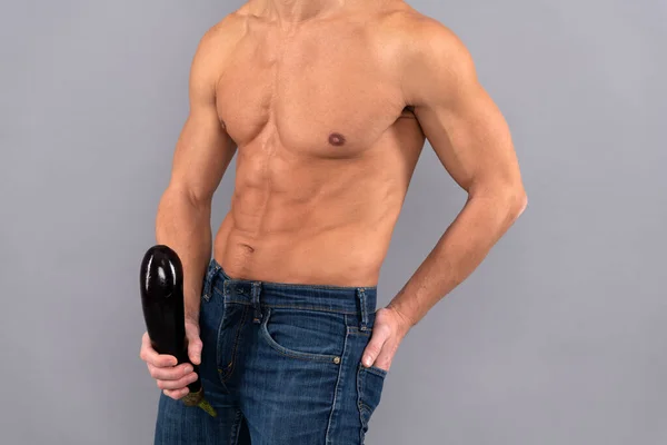 Muscular man with six pack abs representing HorseFil Gummies performance support