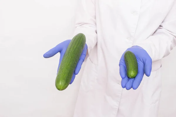 Doctor comparing sizes to illustrate HorseFil Gummies results